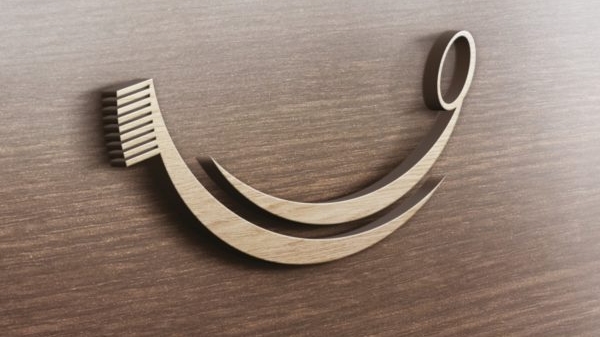 Zahnbürste Logo auf Holzwand
